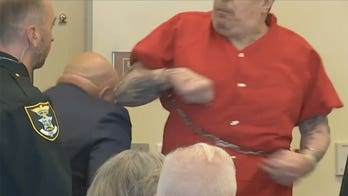 Convicted murderer attacks his attorney in bizarre courtroom clash: 'I used to box'