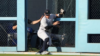 Aaron Judge breaks through Dodger Stadium fence after insane running catch