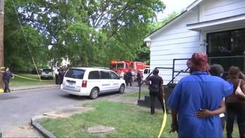 Memphis father detained after four young children die in apartment fire