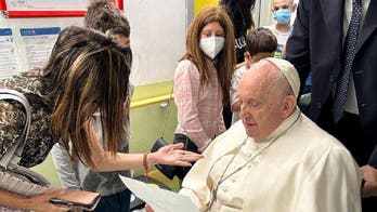 Pope Francis makes first public appearance post-surgery, visits children's ward before discharge from hospital