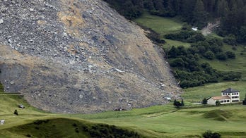 Huge mass of rock slides down Swiss mountainside, narrowly misses small village