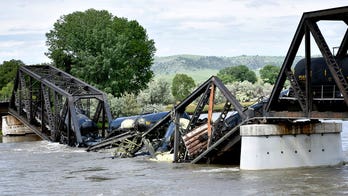 Crews in Montana begin work to clean up train derailment site in Yellowstone River