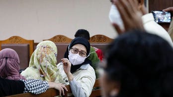 Indonesia police probe drug regulator over cough syrup linked to 200 child deaths