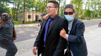 Chinese ex-official's wife says repatriation pressure turned life 'upside-down' overnight