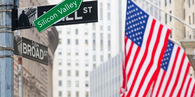 The Wall Street sign is covered by a "Silicon Valley" Sticker.
