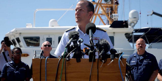 Rear Admiral John Mauger, the First Coast Guard District commander speaks during a press conference