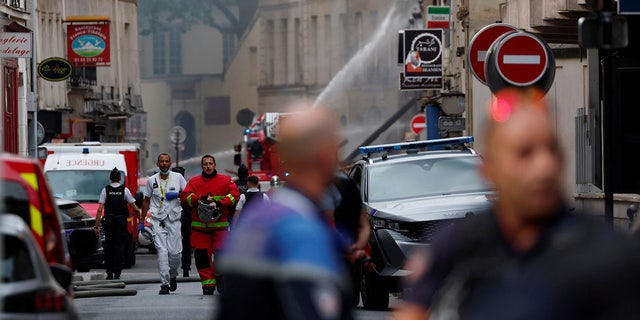 Paris firefighters battle explosion
