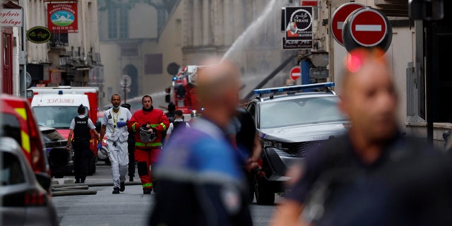 Paris firefighters battle explosion