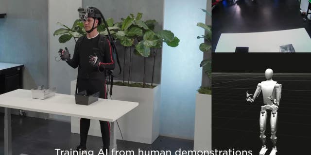 Man in a motion capture suit, training AI.