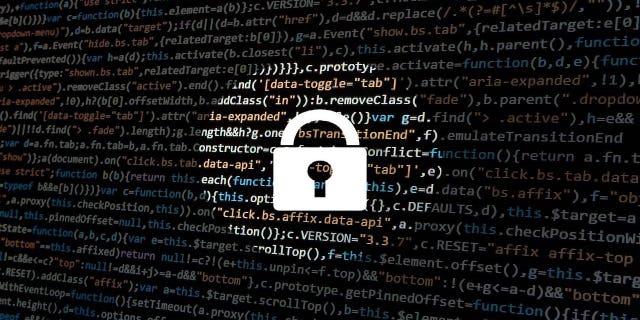 White lock circled with spotlight on on a computer screen showing data