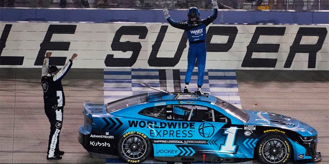 Ross Chastain celebrates atop his car