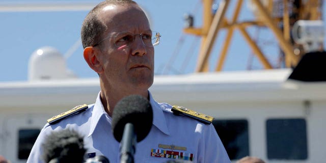 Rear Admiral John Mauger, the First Coast Guard District commander speaks during a press conference