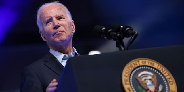 Biden looking serious at podium