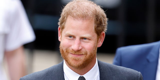 A close-up of Prince Harry in a suit