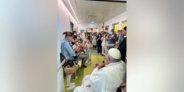 Pope Francis makes first public appearance post-surgery, visits children's ward before discharge from hospital 1 Pope Francis hospital Rome