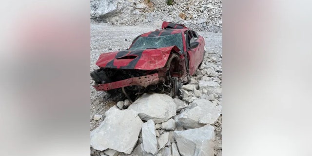 Picture of damaged car in quarry