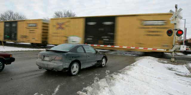 Car stopping for train