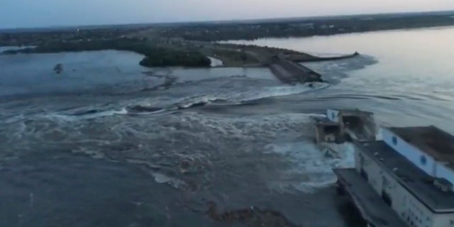 People evacuate after Kakhovka dam damaged