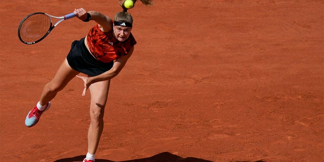 Karolina Muchova serves in the final