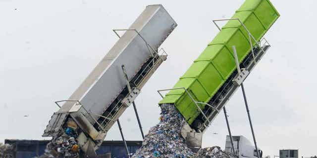 Garbage is unloaded