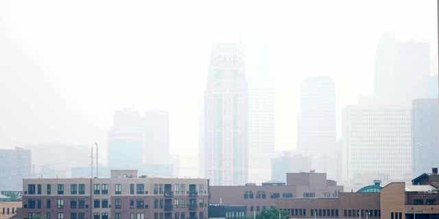 Haze envelopes the Minneapolis skyline