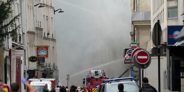 Paris firetrucks and firefighters battle blaze