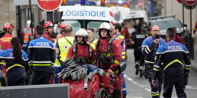 Paris emergency responders after explosion and fire