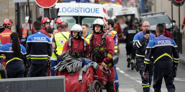 Paris emergency responders after explosion and fire