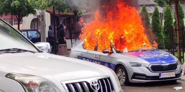 Police car on fire in Kosovo