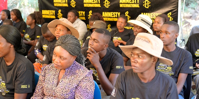 Women and men attend a workshop on sexual health