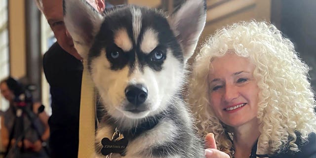 Uconn President Radenka Maric with the new school mascot