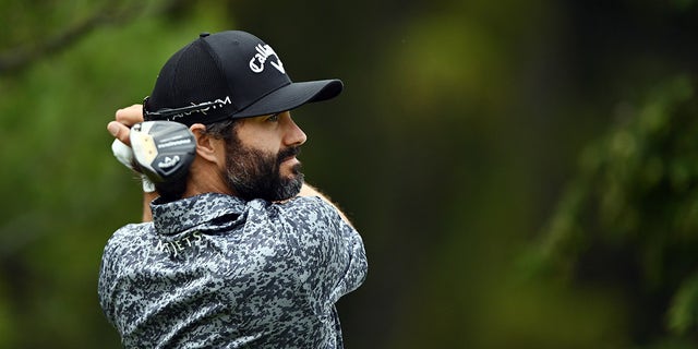 Adam Hadwin swings golf club