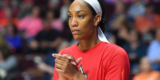 A'ja Wilson looks on