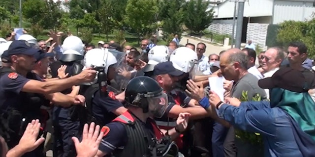 Albanian police clash with Iranian dissidents