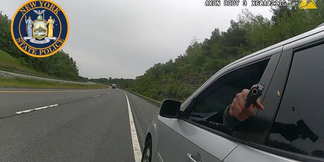 Suspect pointing gun