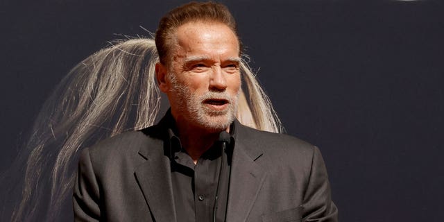 Arnold Schwarzenegger attends a star ceremony
