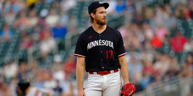 Bailey Ober reacts after giving up home run