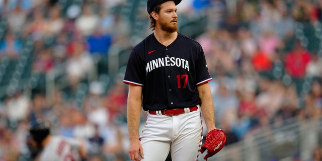 Bailey Ober reacts after giving up home run