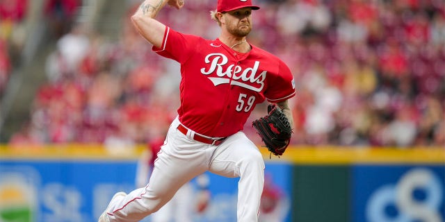 Ben Lively throws during first inning
