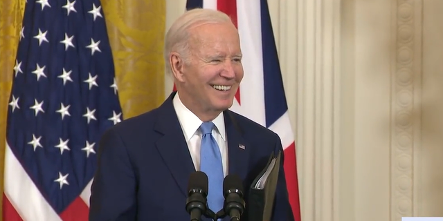 Biden laughing