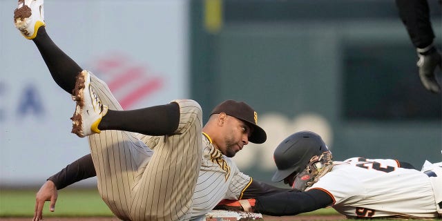 Luis Matos steals second base