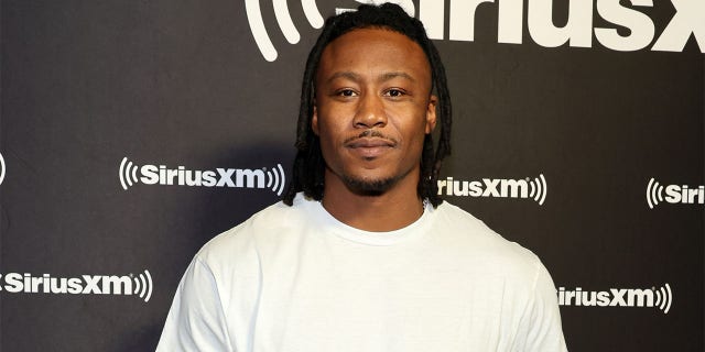 Brandon Marshall poses for photo