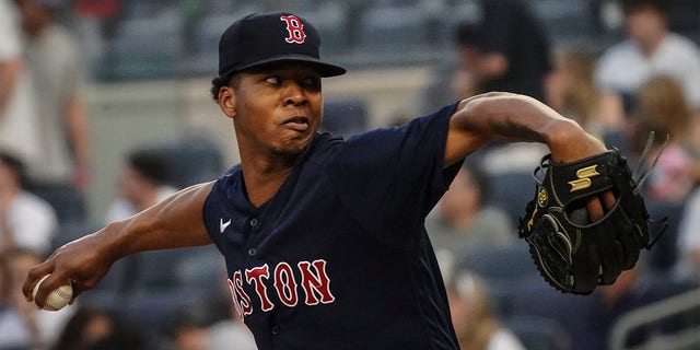 Brayan Bello throws pitch