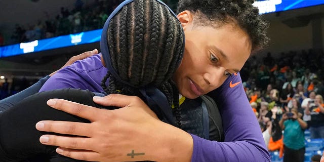 Brittney Griner hugs Odyssey Sims