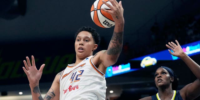 Brittney Griner grabs a rebound