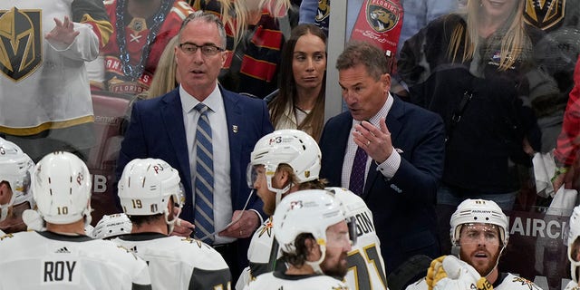 Bruce Cassidy speaks with his team