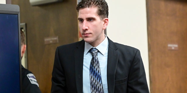 Bryan Kohberger enters a courtroom