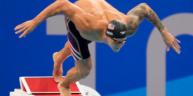 Caeleb Dressel leaps into water