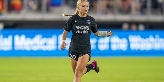 Chloe Ricketts sprints down field