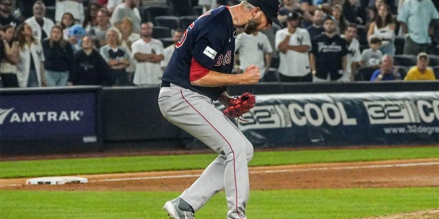 Chris Martin celebrates